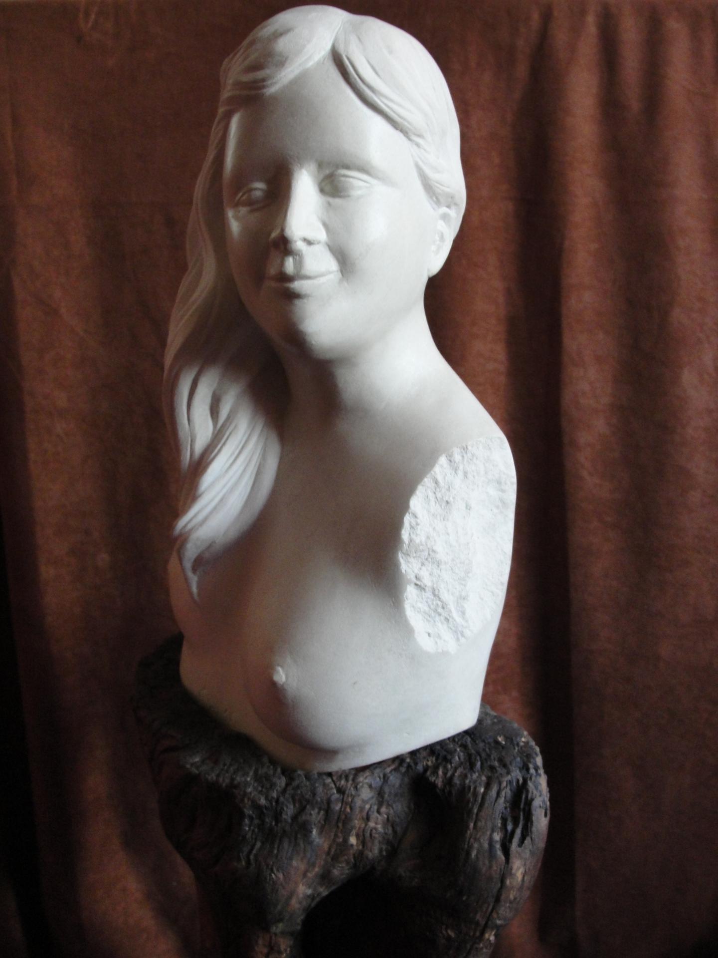 Sculpture sur pierre, buste d'Eve